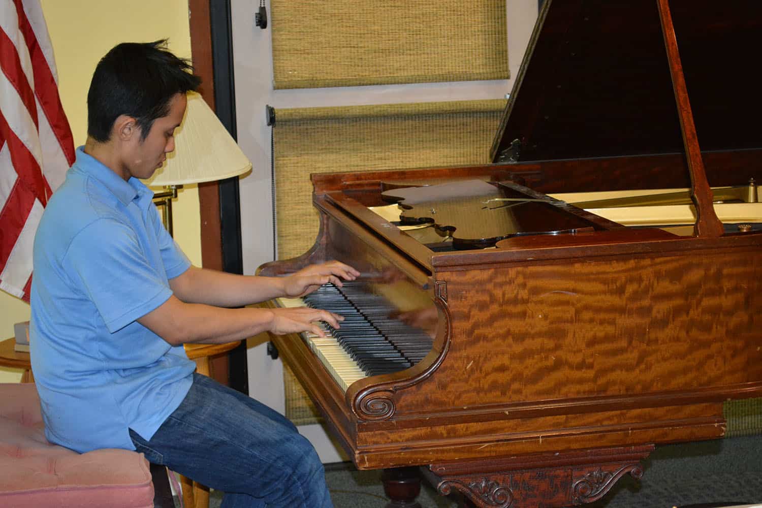 An Arts on Tour pianist plays Broadview’s grand piano.