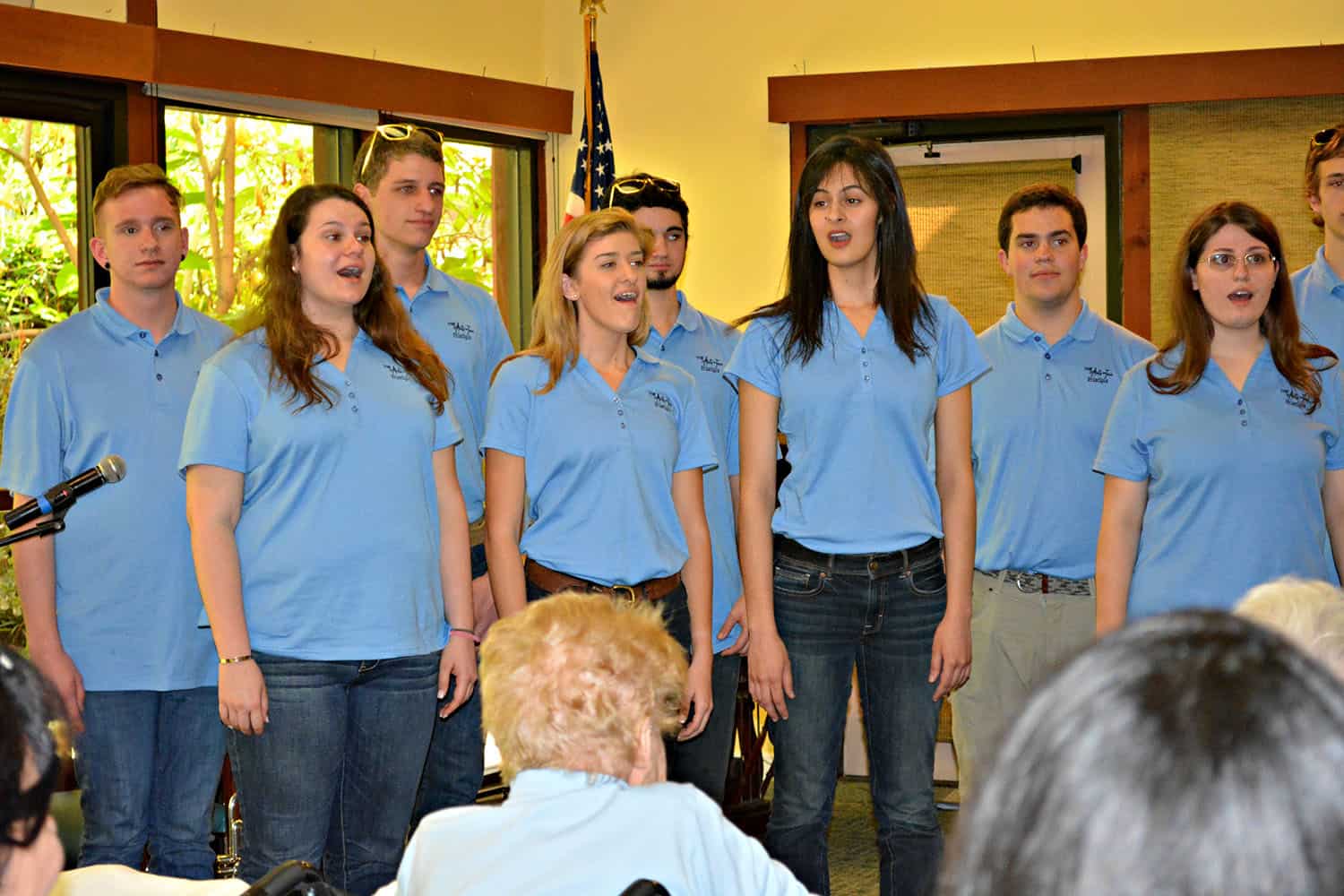 Arts on Tour singers perform for seated Broadview guests.