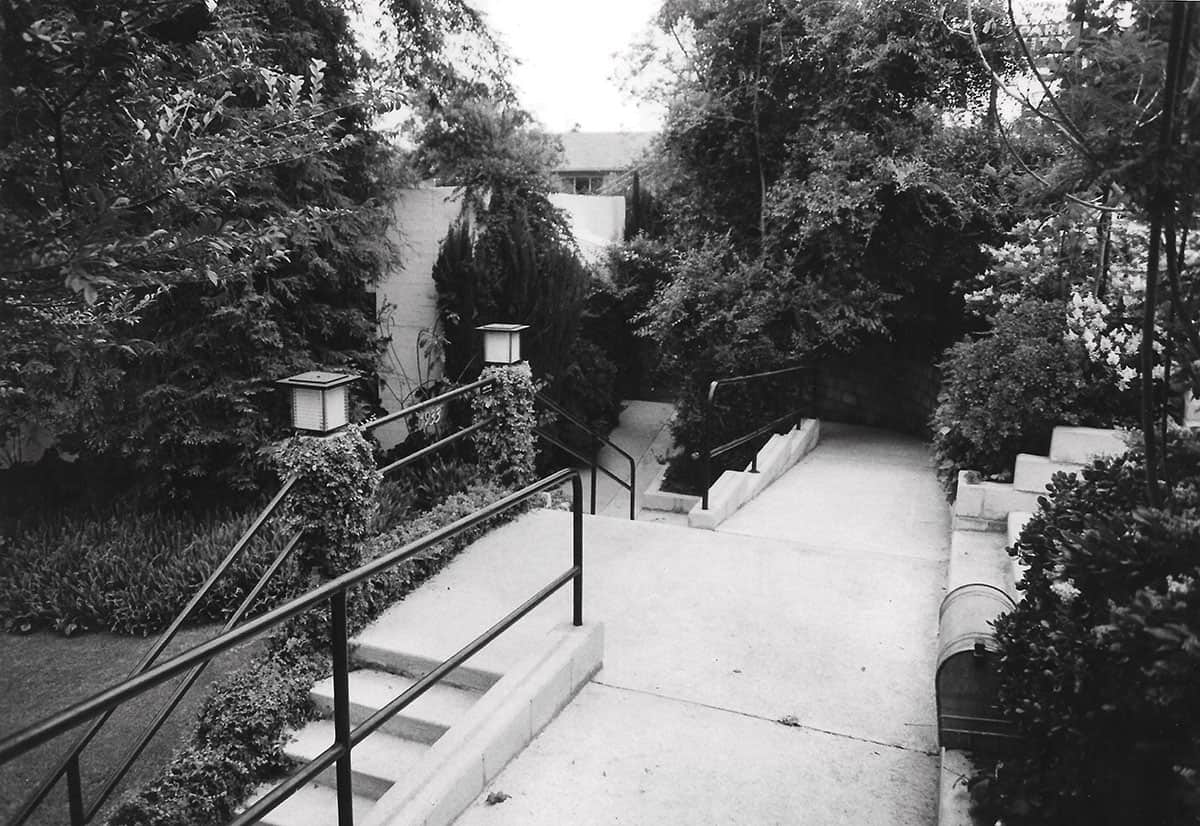 Landscaped walkways, steps, and handrails on the Griffith Park Maternity Home grounds.
